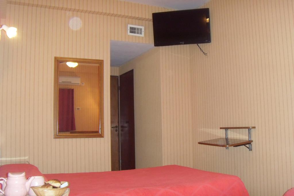 Hotel Embajador Rosario Pokoj fotografie