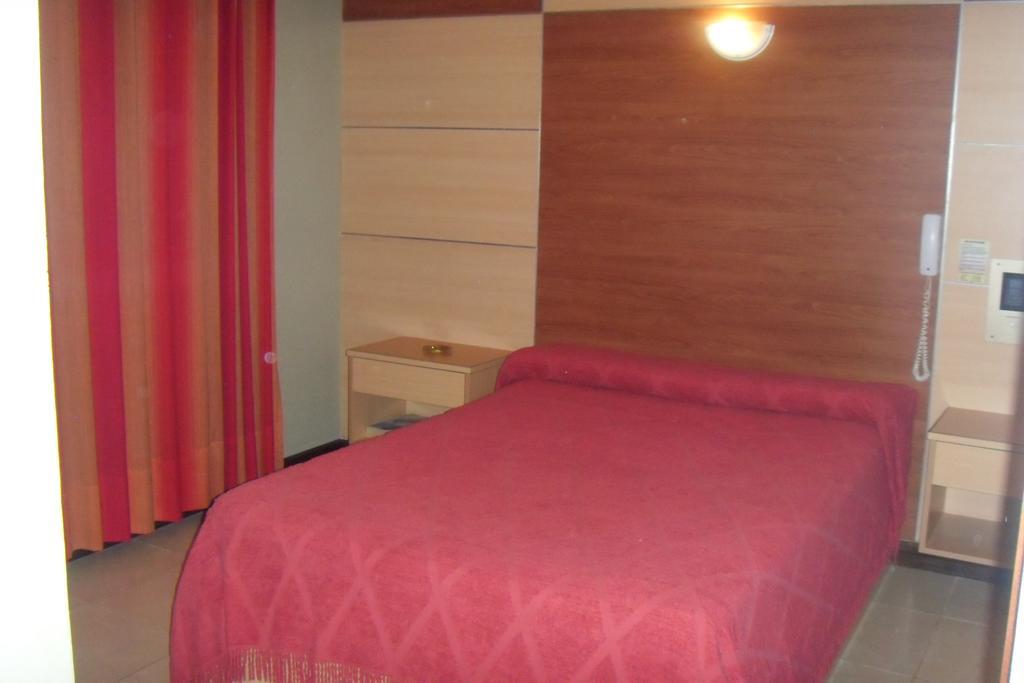 Hotel Embajador Rosario Pokoj fotografie
