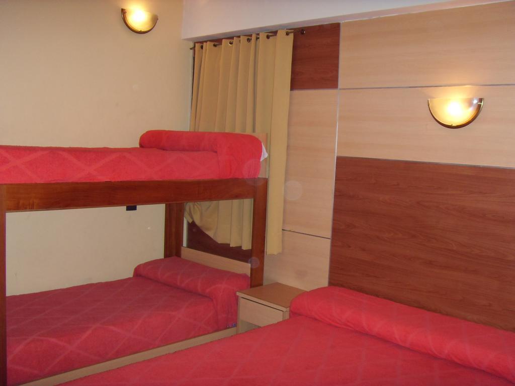 Hotel Embajador Rosario Pokoj fotografie